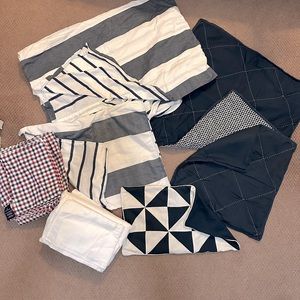 Like new. Nautica Twin 5 piece bedding set. With (2) sheet set